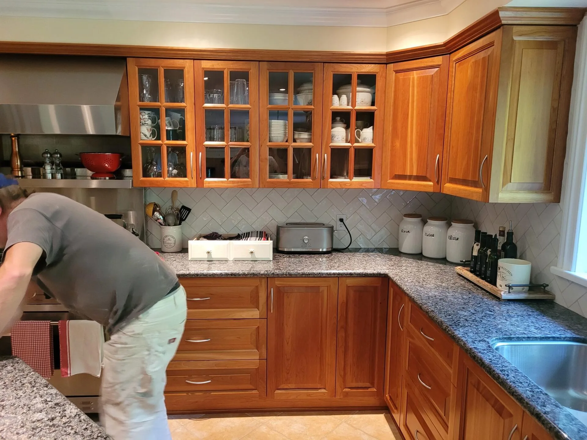 Ottawa kitchen before cabinet refinishing - original dark wood cabinets