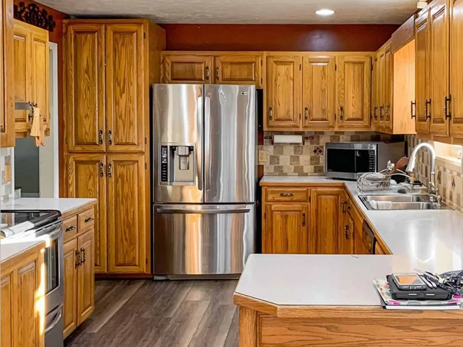 Ottawa kitchen before cabinet refinishing - dated golden oak cabinets
