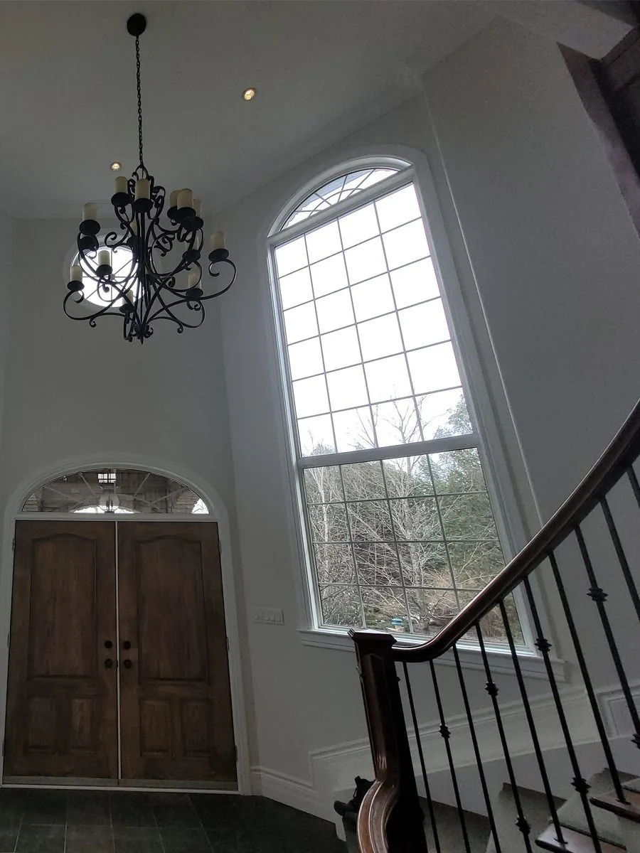 Refinished staircase with updated railing in Ottawa home
